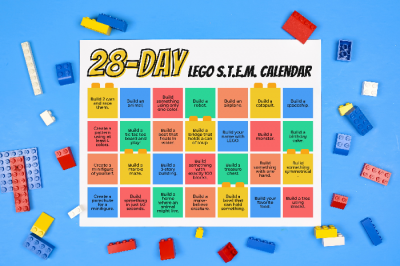 Printable STEM calender on a blue background with LEGO pieces