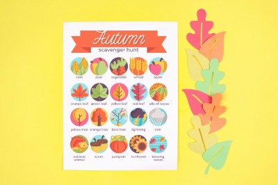 Autumn Scavenger hunt printable with colorful paper leaves on a yellow background