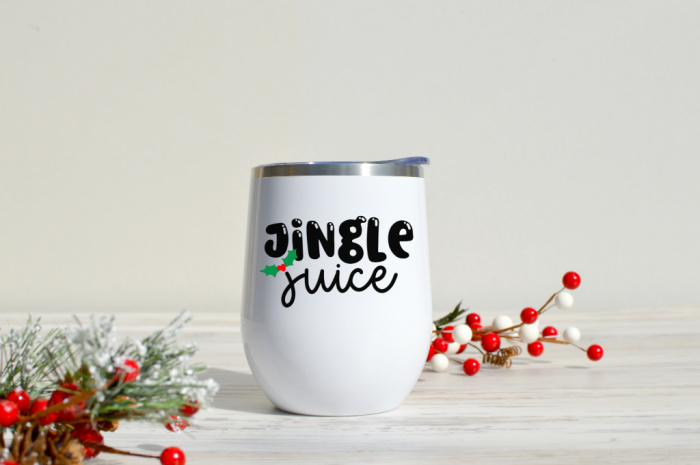 Jingle Juice SVG design on a white wine tumbler