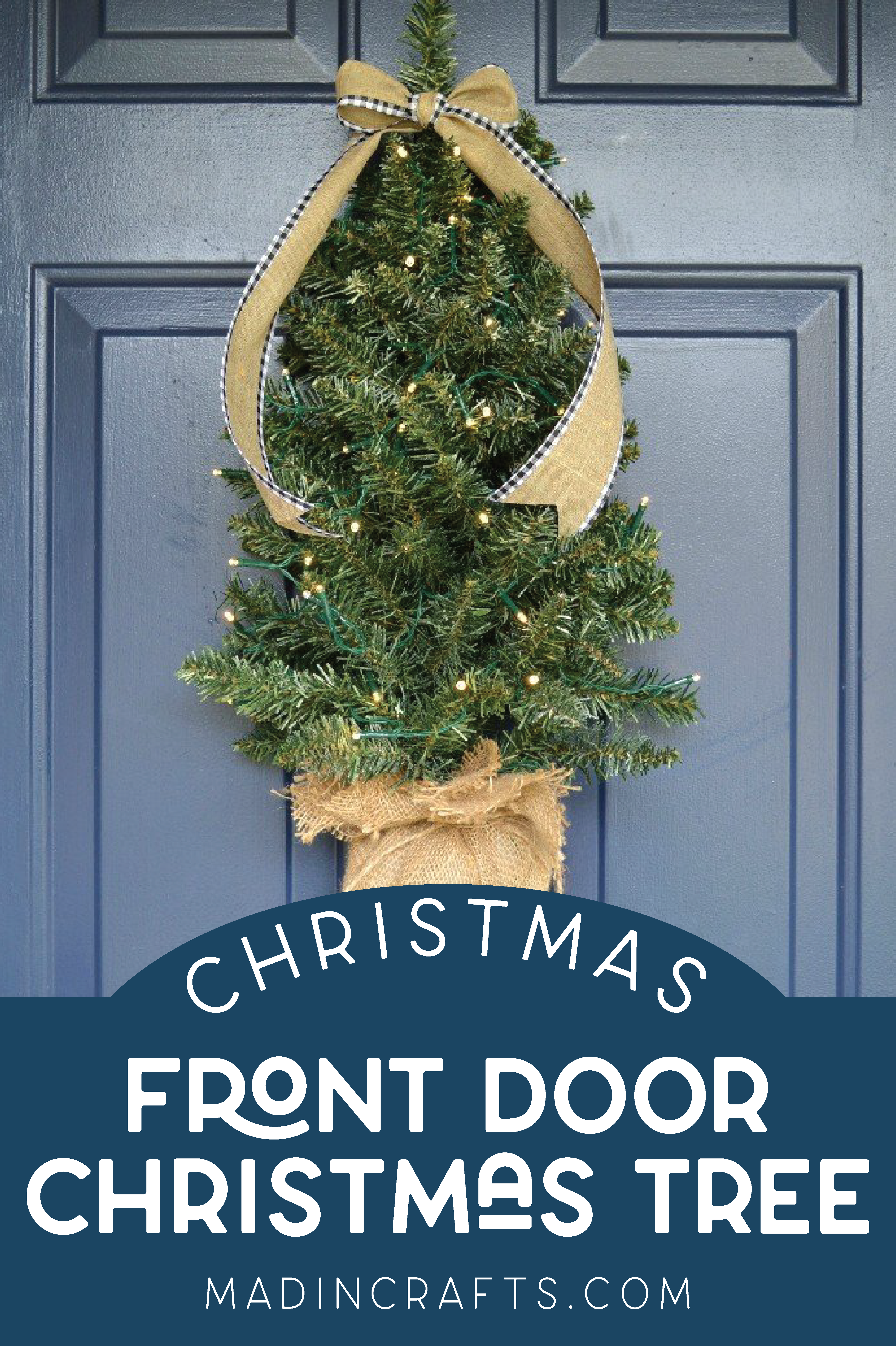 Mini Christmas tree on a blue front door