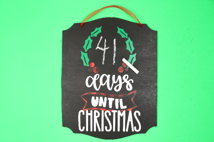 Chalkboard Days until Christmas sign with a piece of chalk on a green background