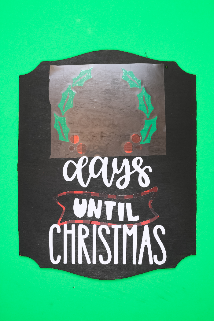 vinyl and transfer tape on a Chalkboard Days until Christmas sign on a green background