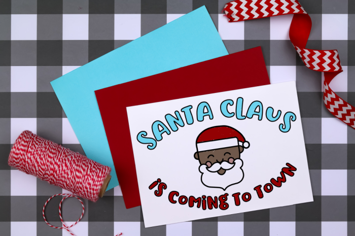 Santa Claus printable coloring card with red and blue envelopes