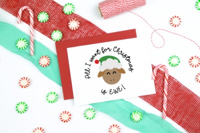All I Want for Christmas is EWE design on white christmas card with candy and baker's twine