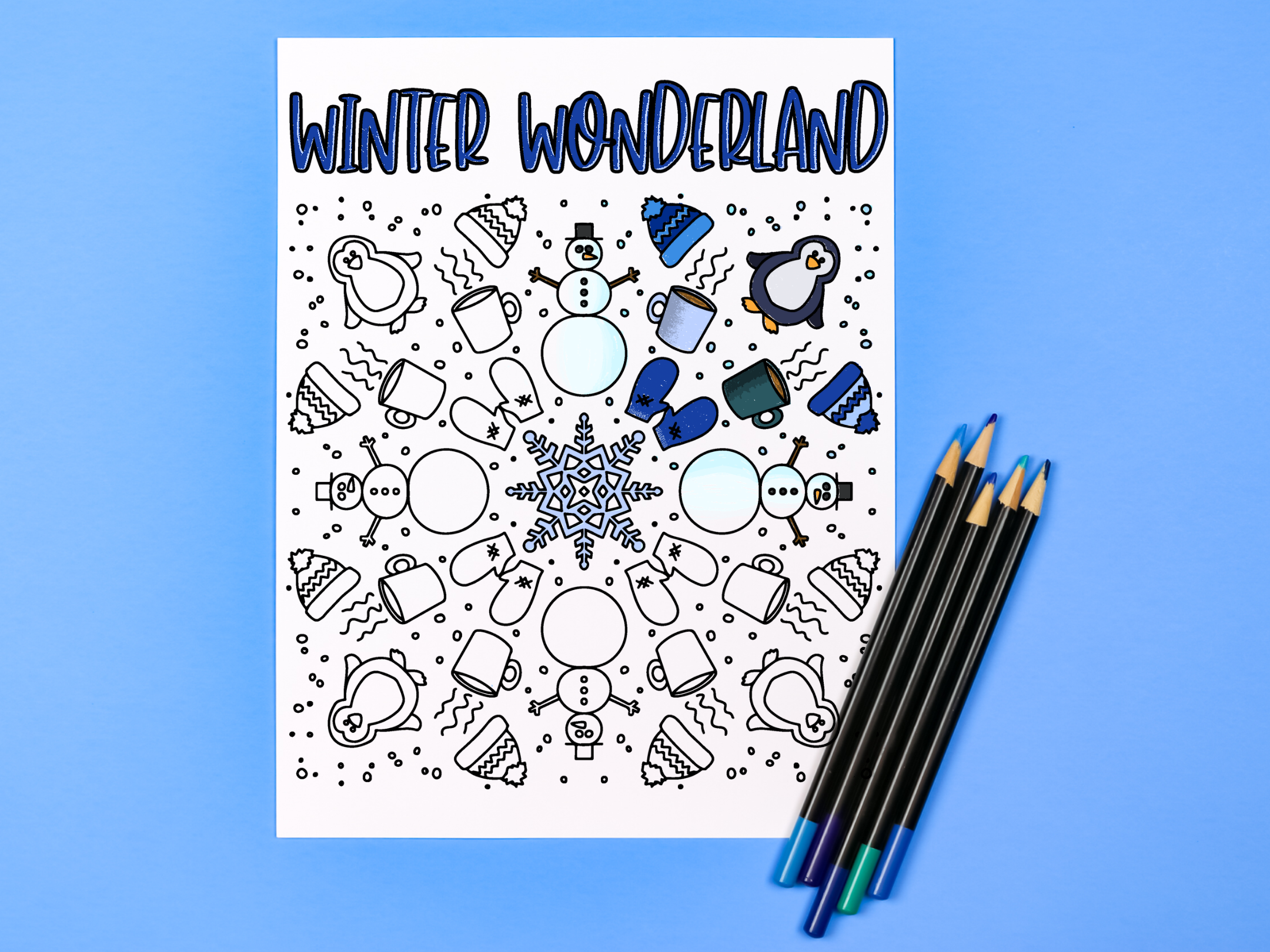 Winter coloring page and colored pencils on a blue background
