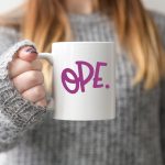 blond woman holding a mug with OPE design