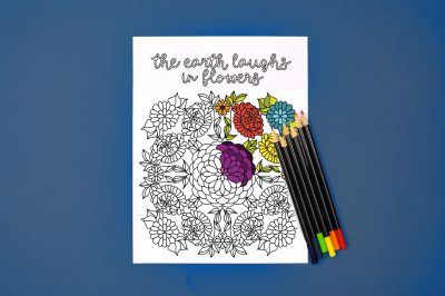 The earth laughs in flowers coloring page with colored pencils