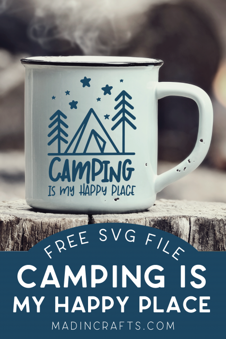 A camping mug with Camping is My Happy Place design on an old log