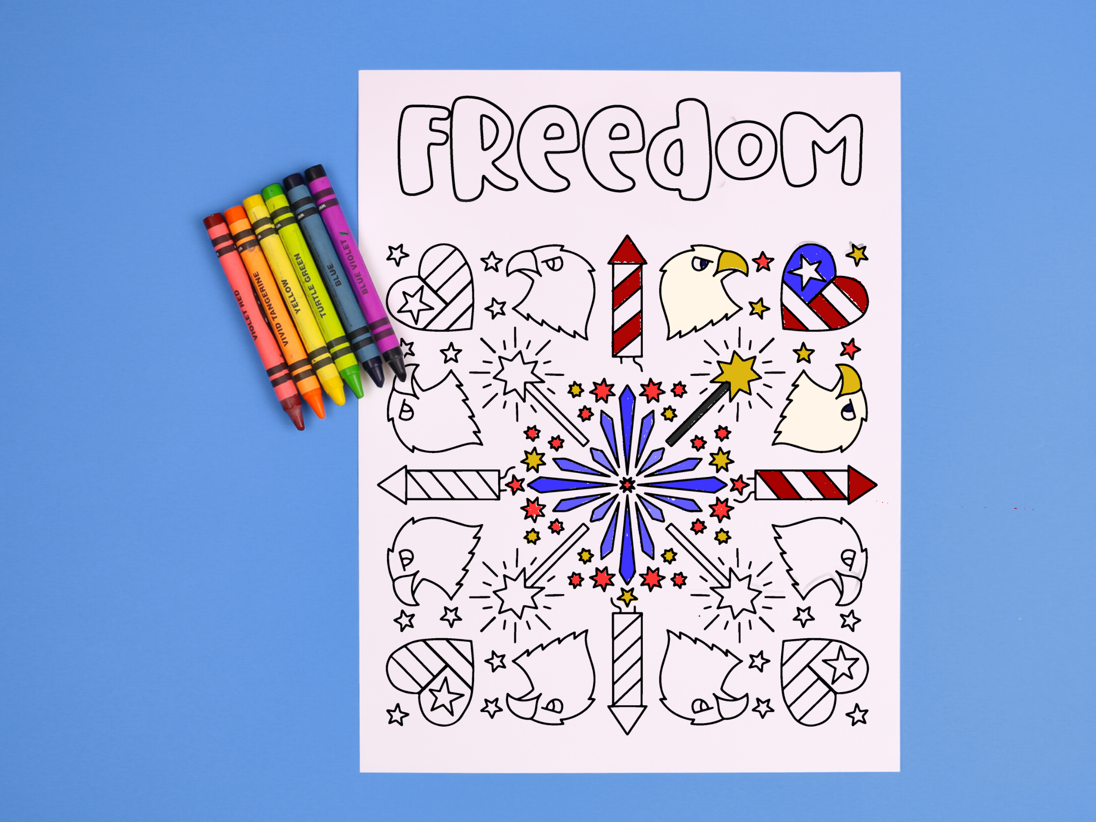 freedom coloring page with crayons on a blue background