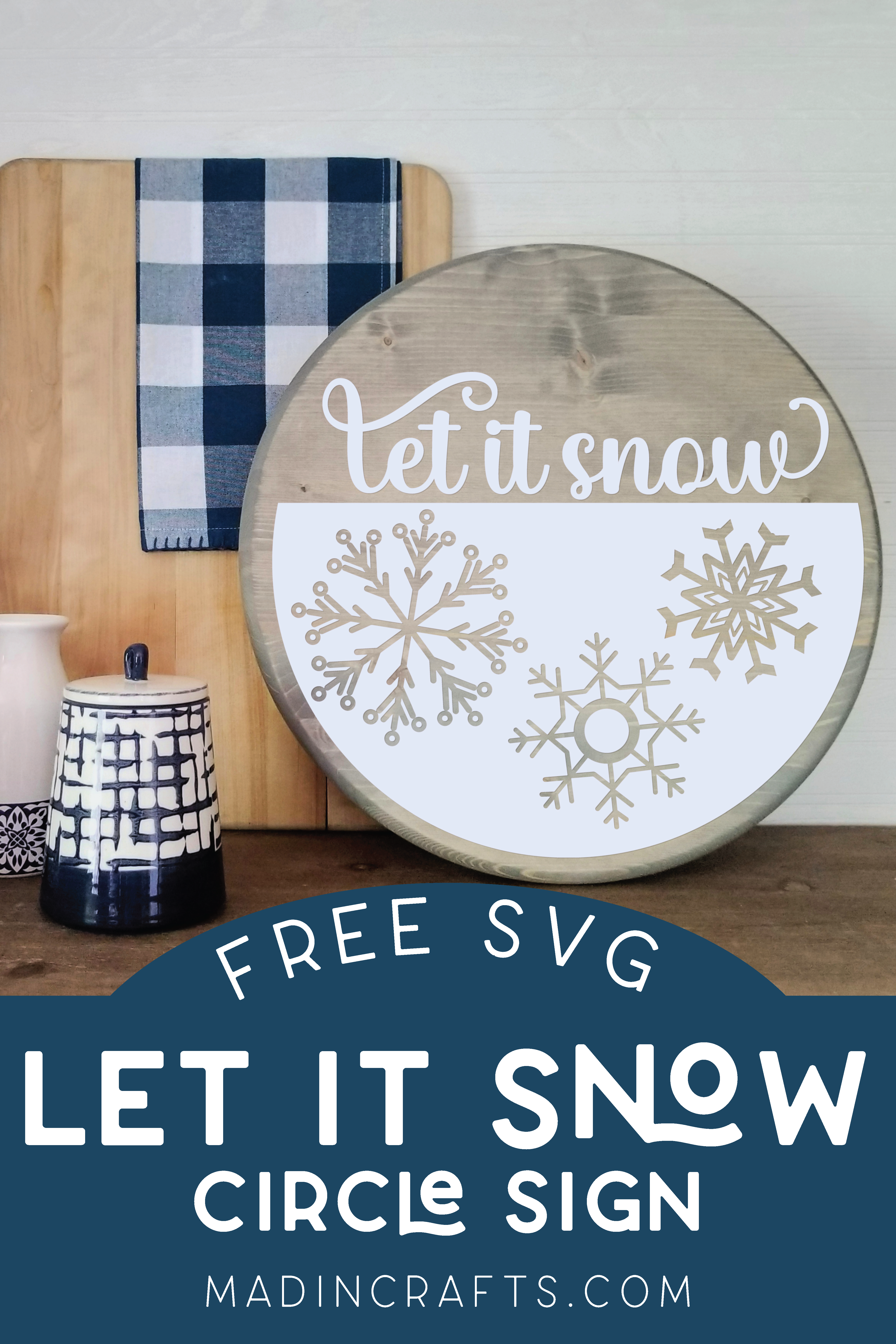 Let It Snow SVG applied to a wood circle displayed with vases and cutting boards