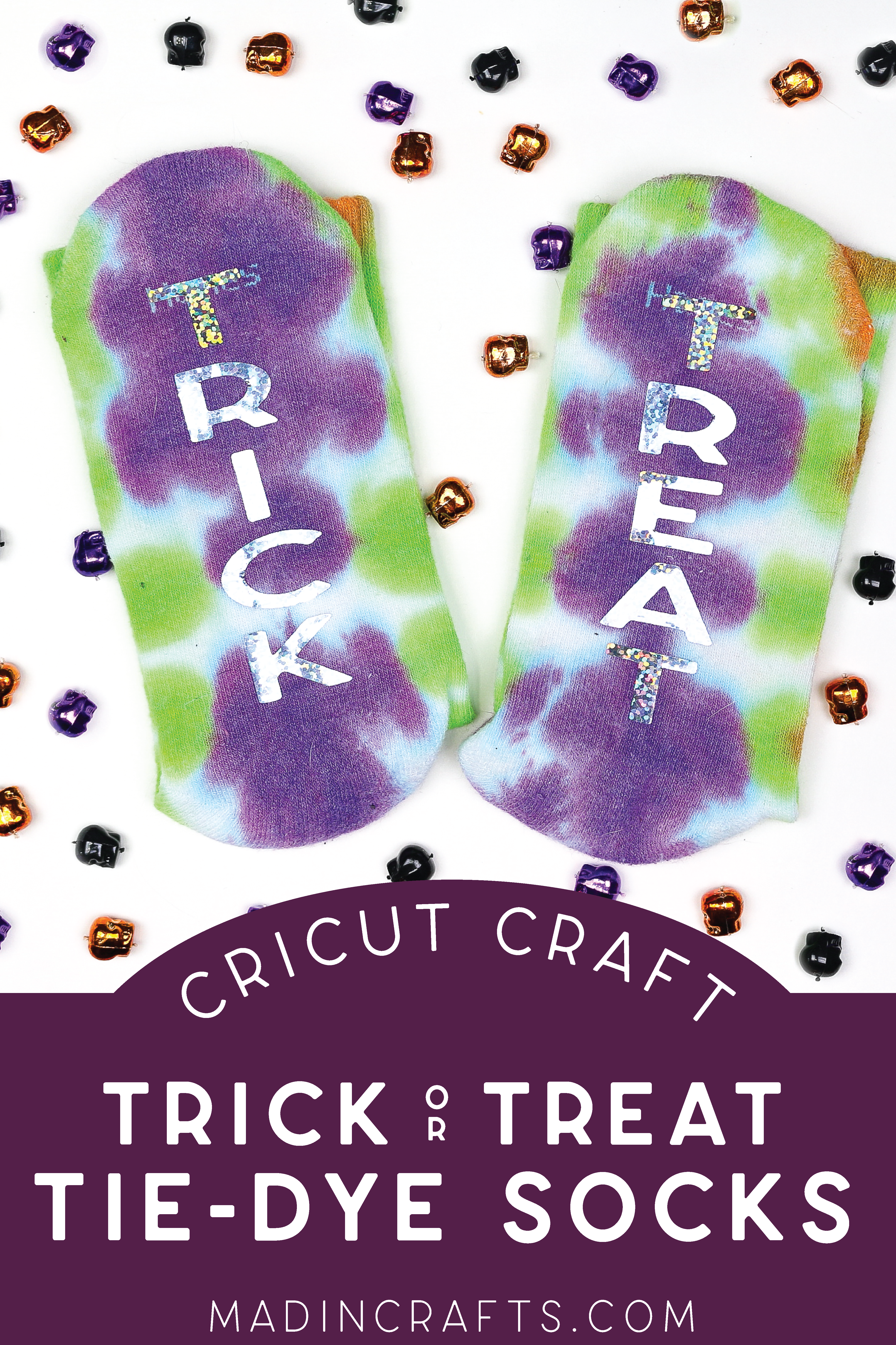 tie dyed socks with TRICK and TREAT in glitter vinyl on a white background