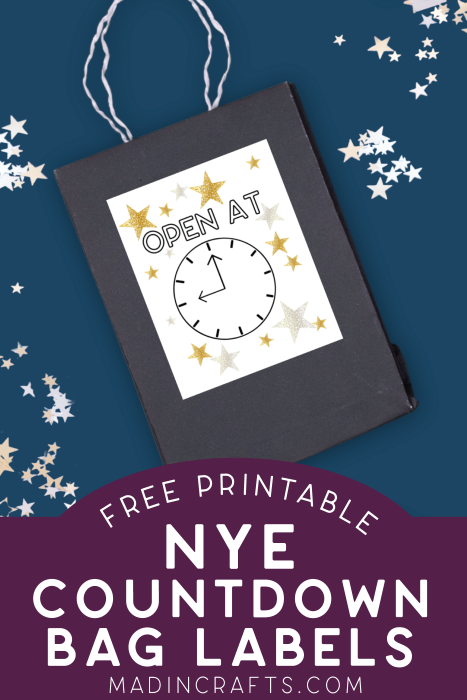 black gift bag with NYE countdown label on a blue background surrounded by star confetti