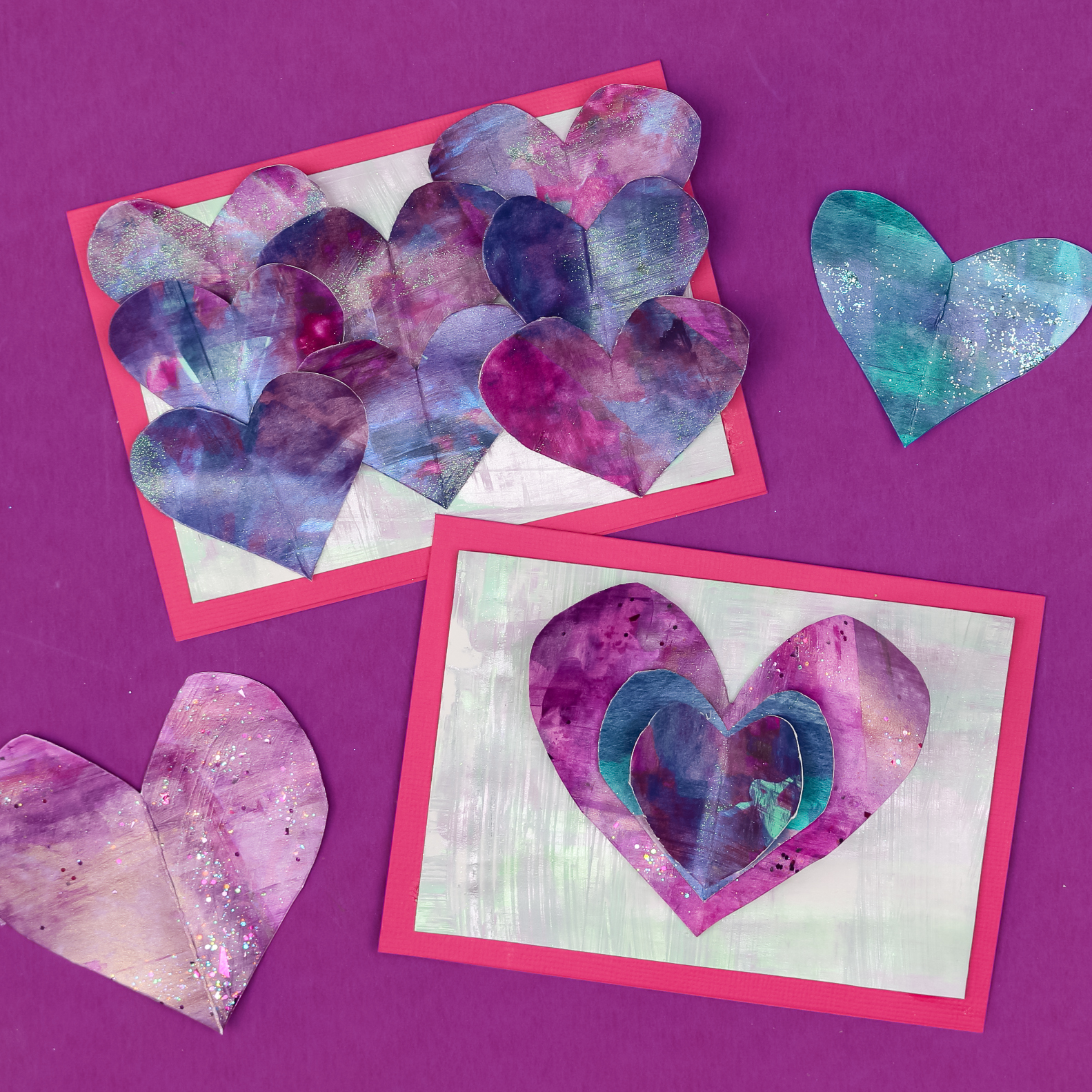 two DIY valentines made with scrape painted paper hearts