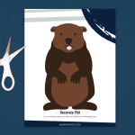 Groundhog Day puppet printable and scissors on a blue background