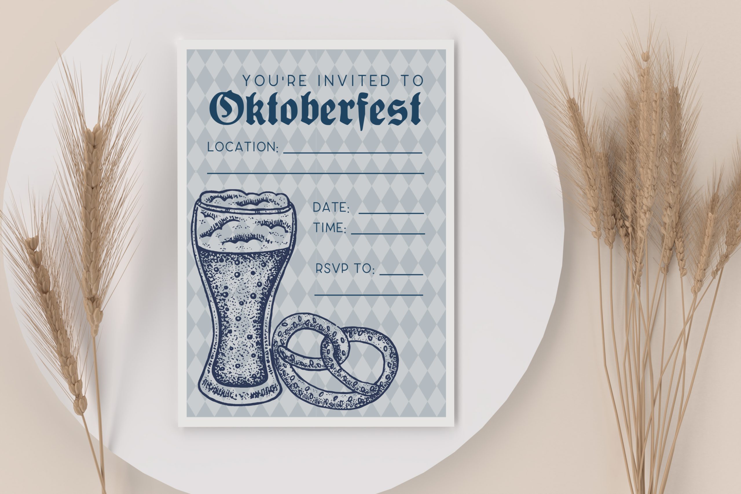 Oktoberfest invitation on a white plate by wheat