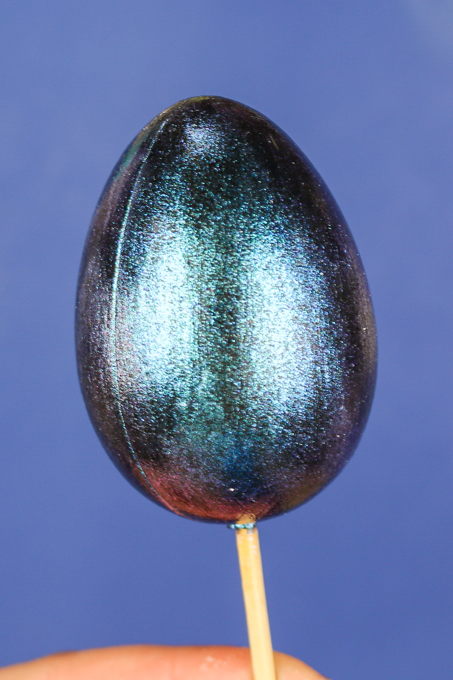 closeup of dragonfly glaze on an easter egg