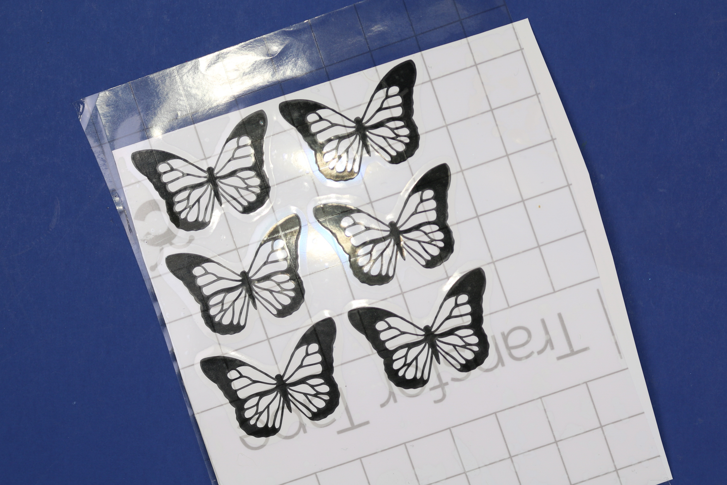 transfer tape applied to vinyl butterflies