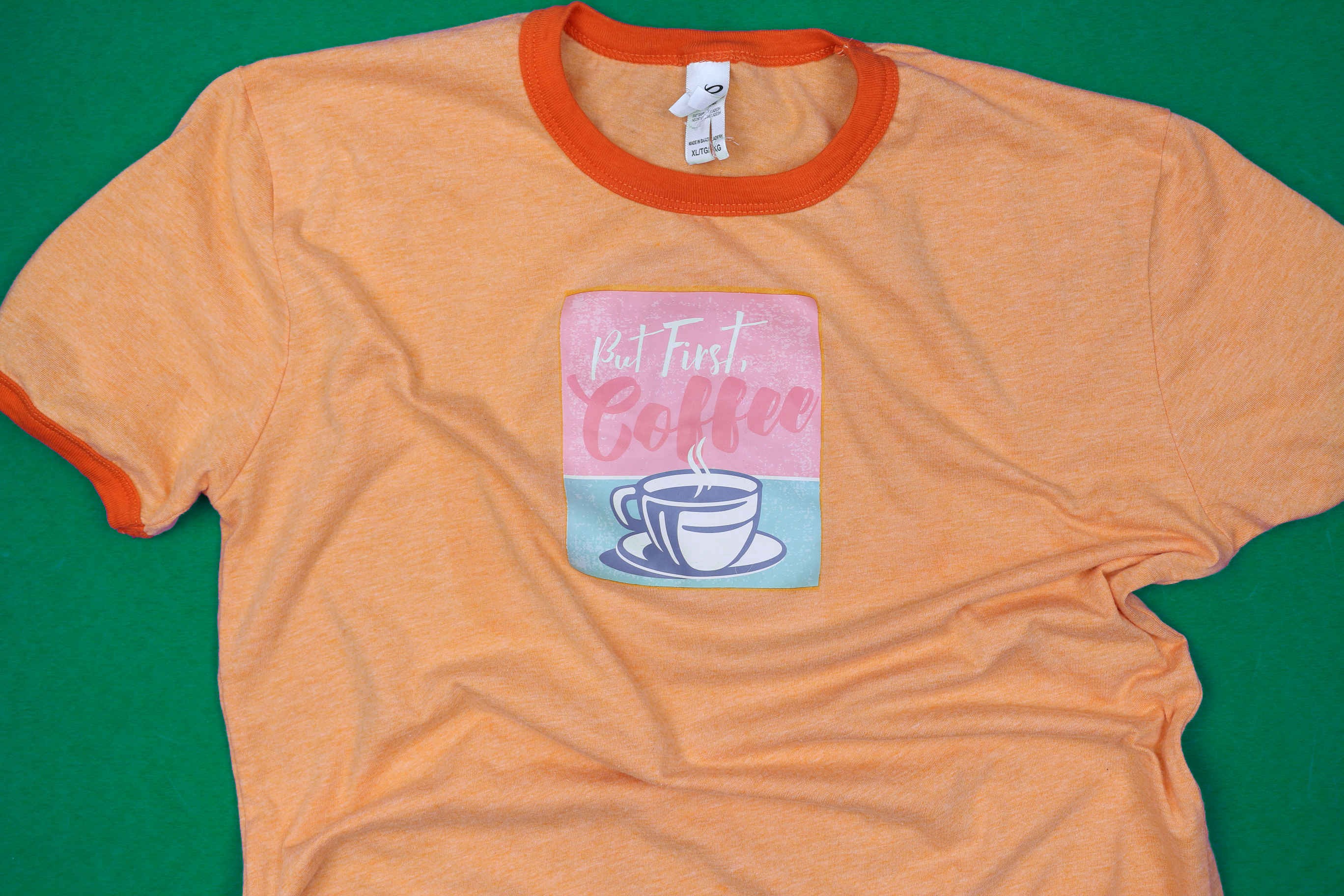 tshirt with dollar store iron on "But First, Coffee" design