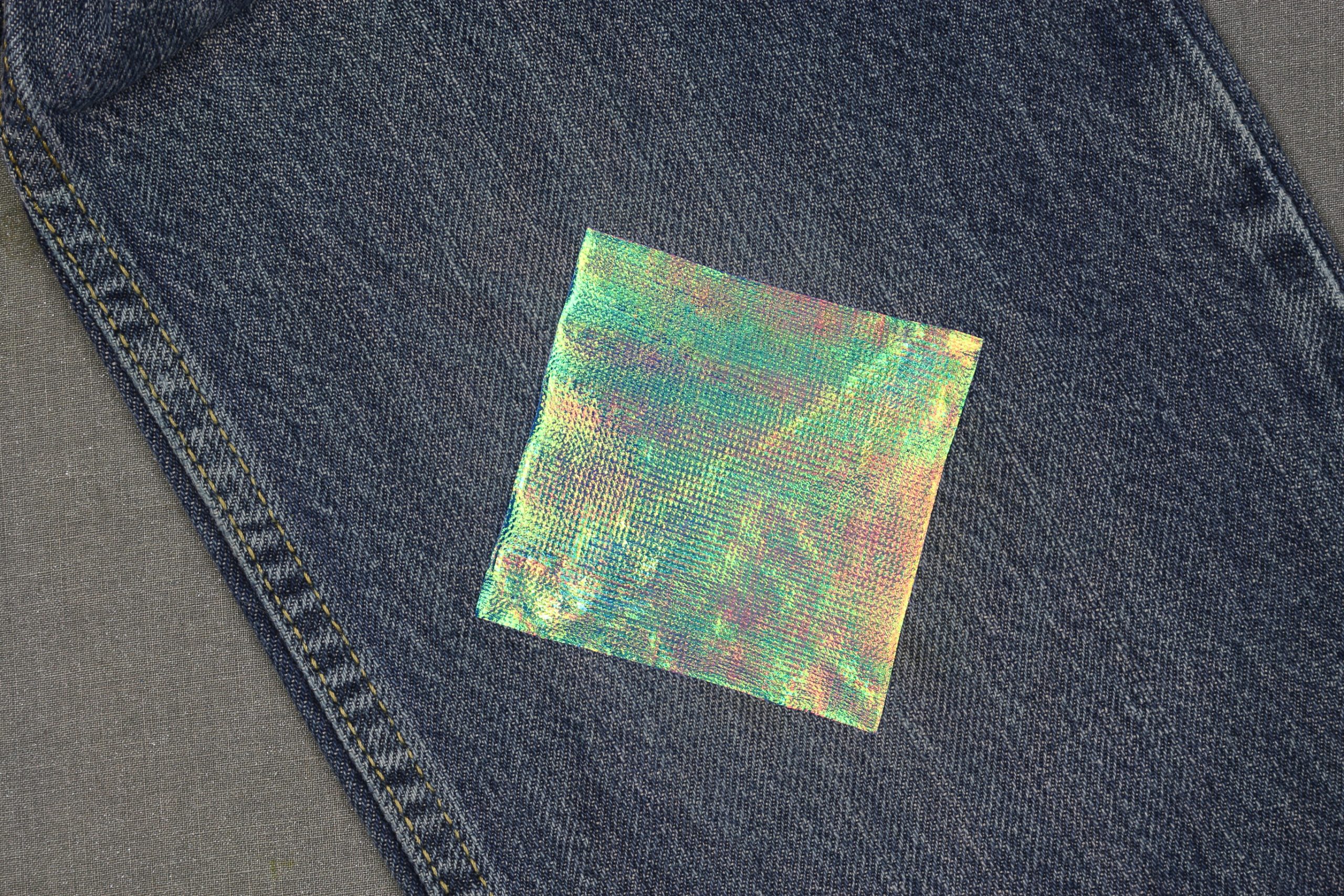 iridescent iron on patch on jeans