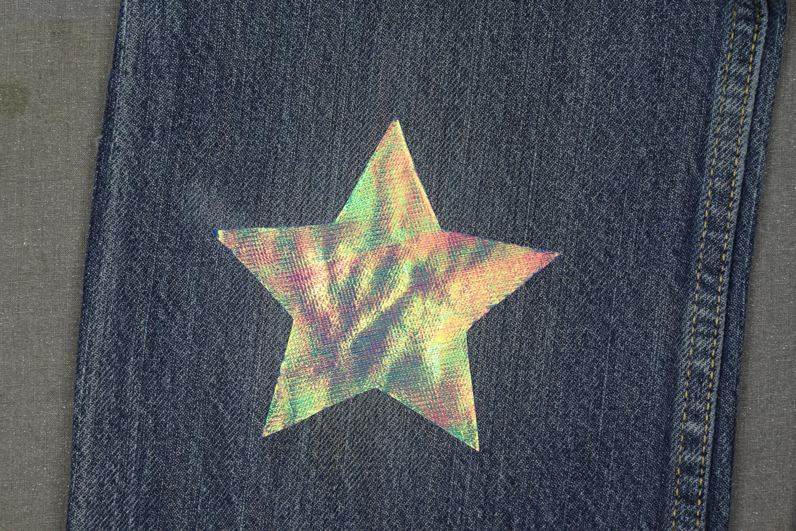 star shaped iridescent patch on jeans