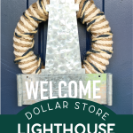 dollar store lighthouse wreath on a navy door