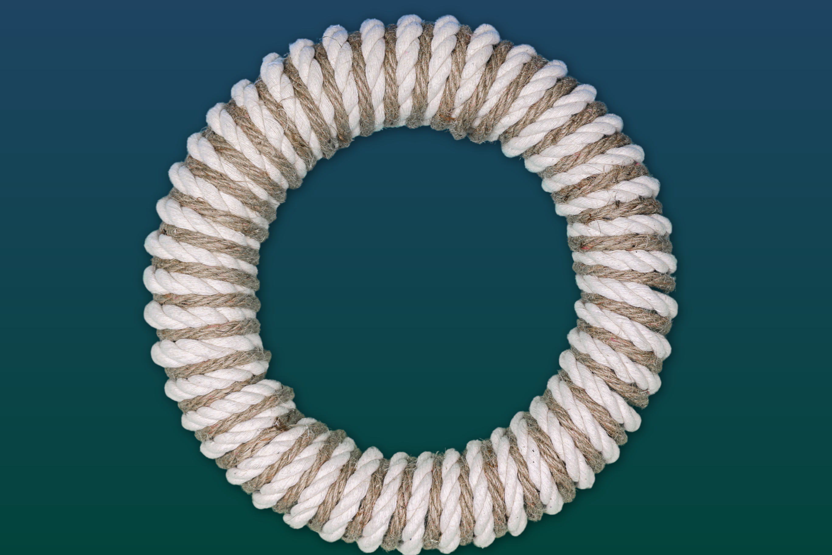wreath wrapped with white nautical rope and brown sisal rope