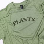 Green tshirt that reads "PLANTS" in Puff htv