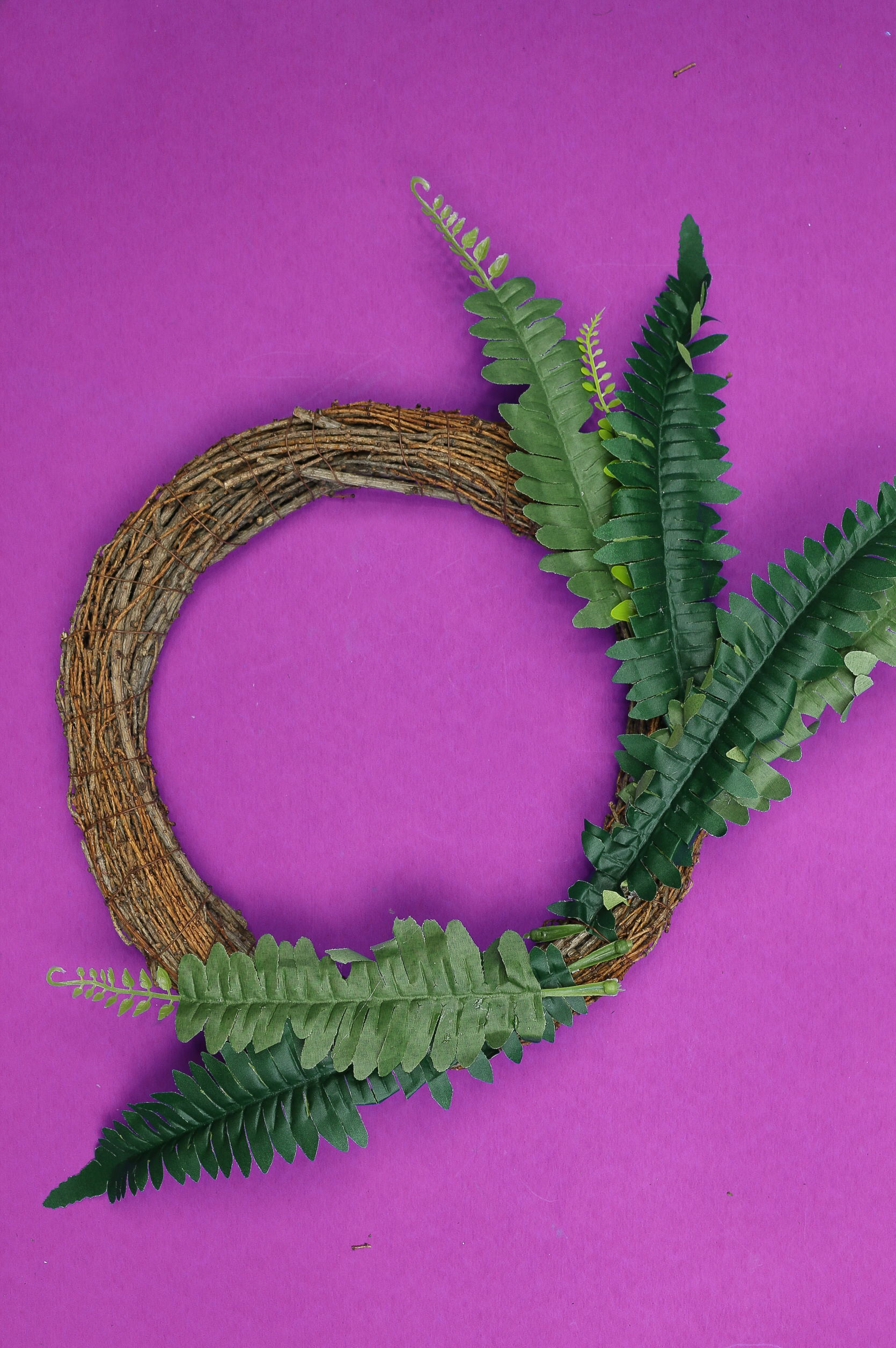 grapeview wreath decorated with faux ferns,