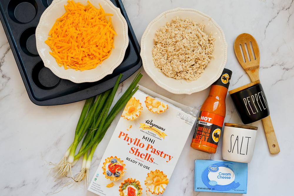 flat lay of all the ingredients needed for buffalo chicken cup appetizers