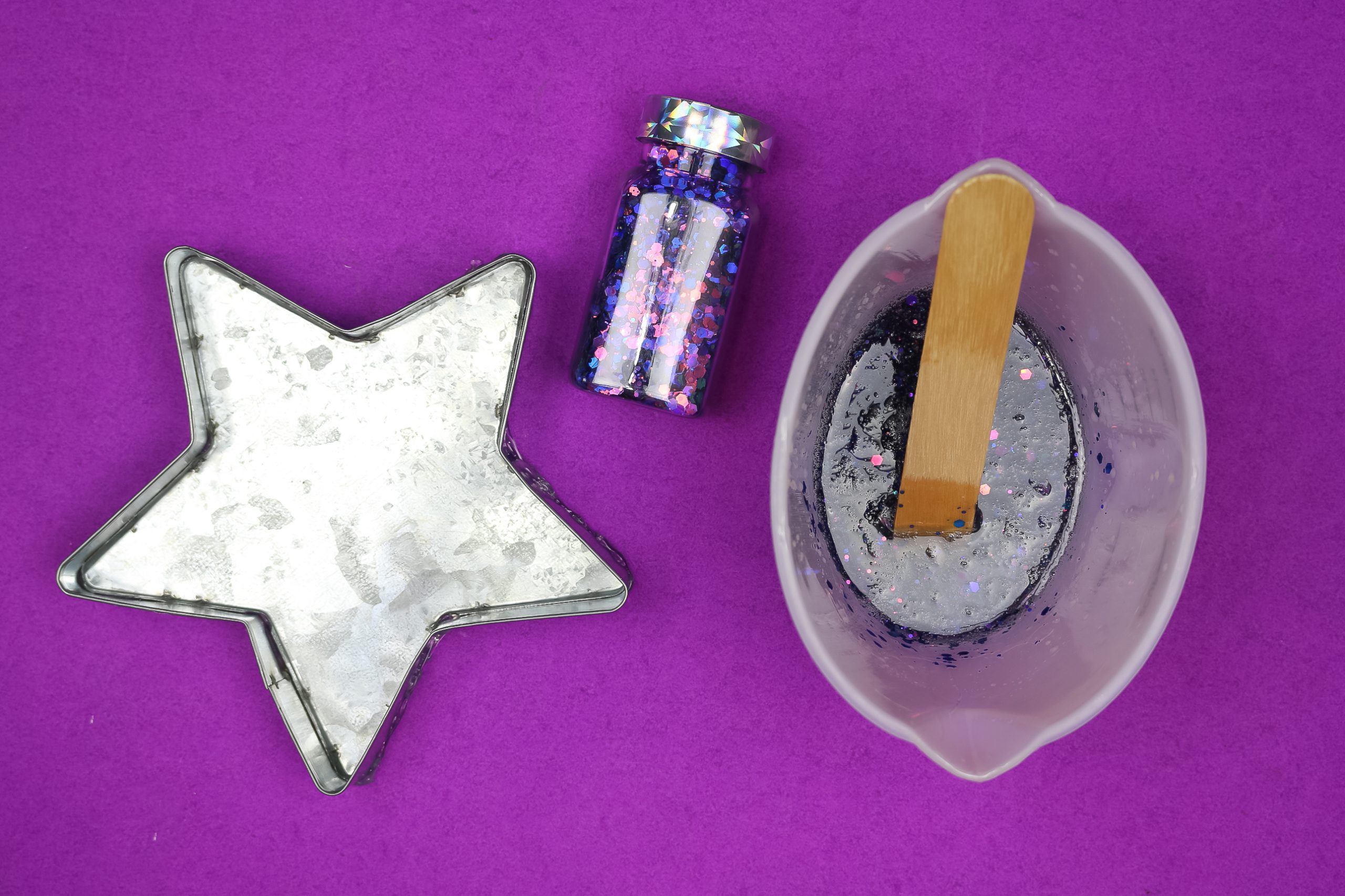 star shaped tray, purple chunky glitter, and mixed resin