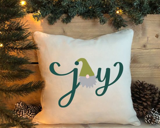 Joy Gnome SVG design on a white pillow