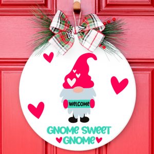 gnome sweet gnome circle sign on a red door