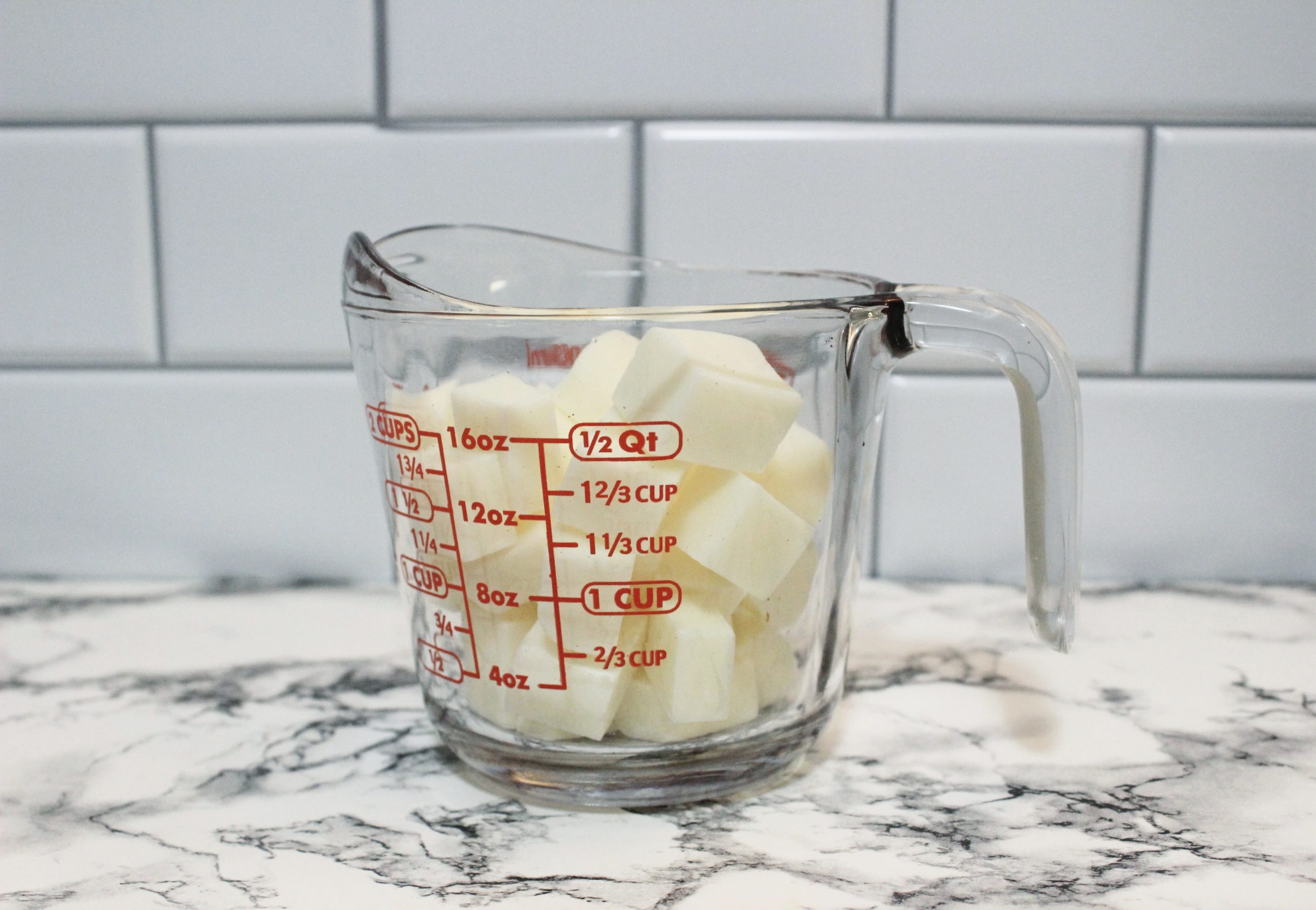 melt and pour soap in a measuring cup