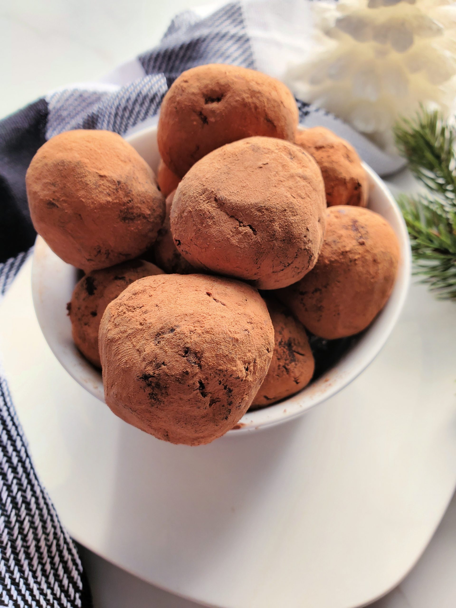bowl of cocoa dusted chocolate amaretto truffles