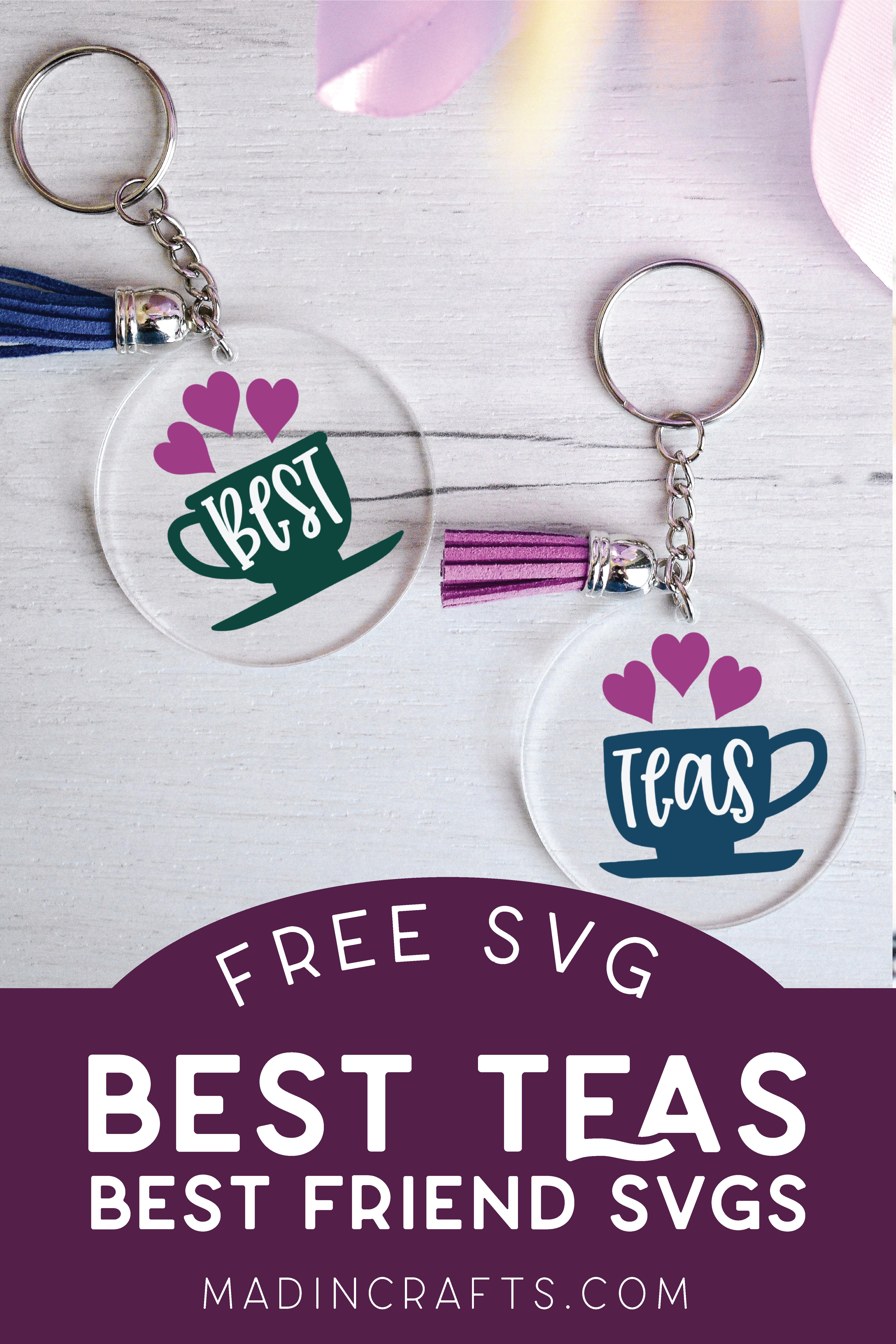 two acrylic key chains with Best and Teas in vinyl