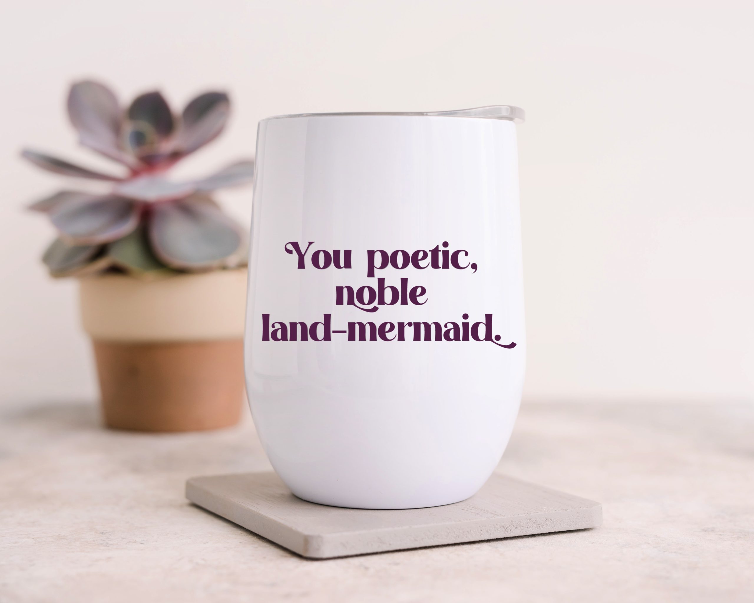 white wine tumbler that reads You poetic, noble land mermaid