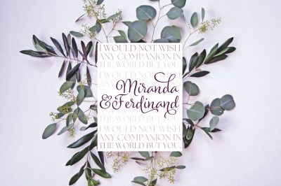 A printable featuring Miranda & Ferdinand from The Tempest sitting on preserved florals.