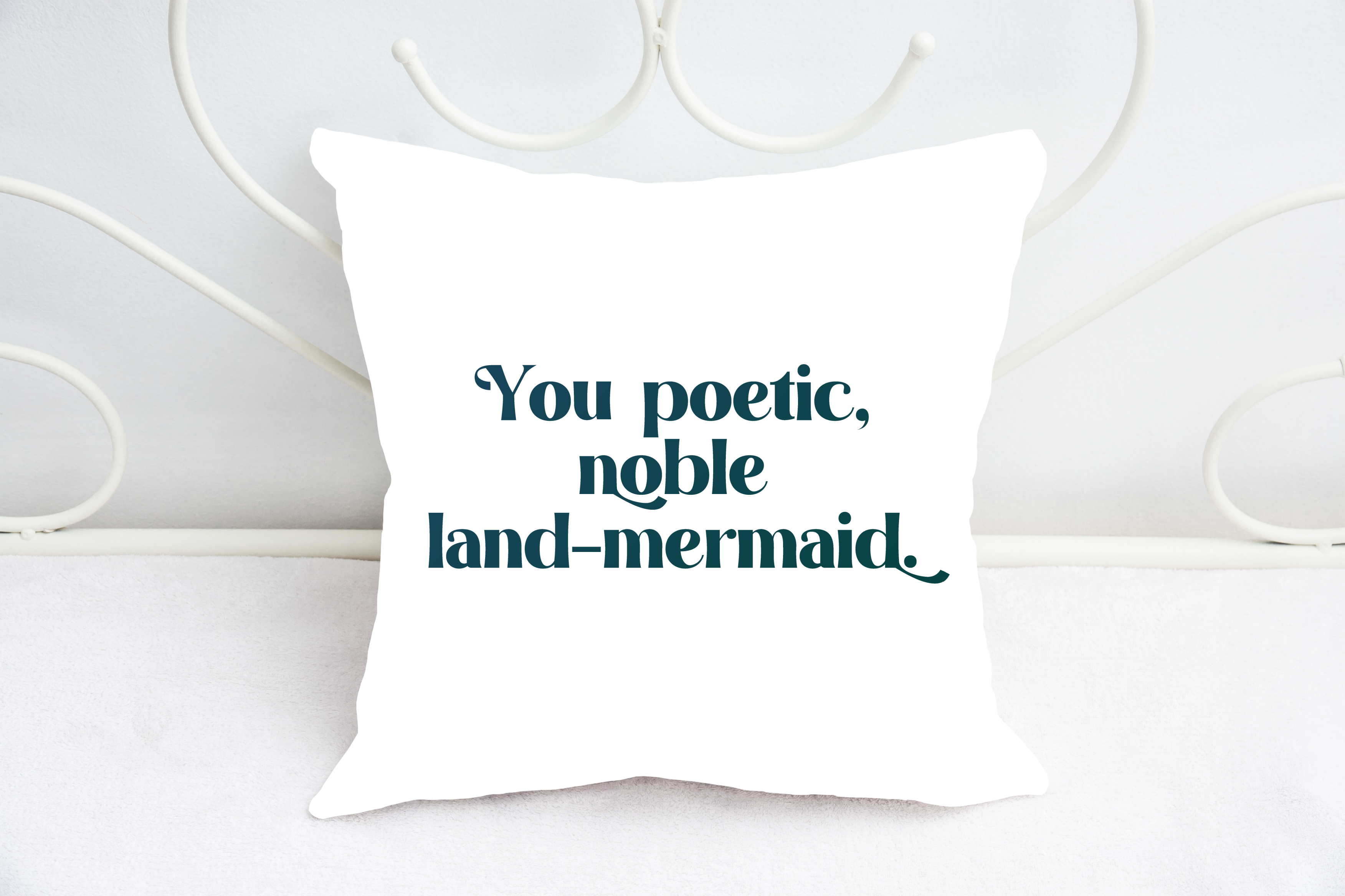 white throw pillow that reads You poetic, noble land mermaid