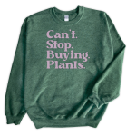 Green crew neck sweatshirt with lilac Can't Stop Buying Plants in vinyl.