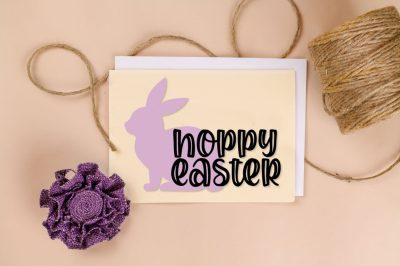 Tan homemade card with Hoppy Easter SVG design near twine