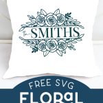 A family name SVG on a white pillow on a white framed bed.