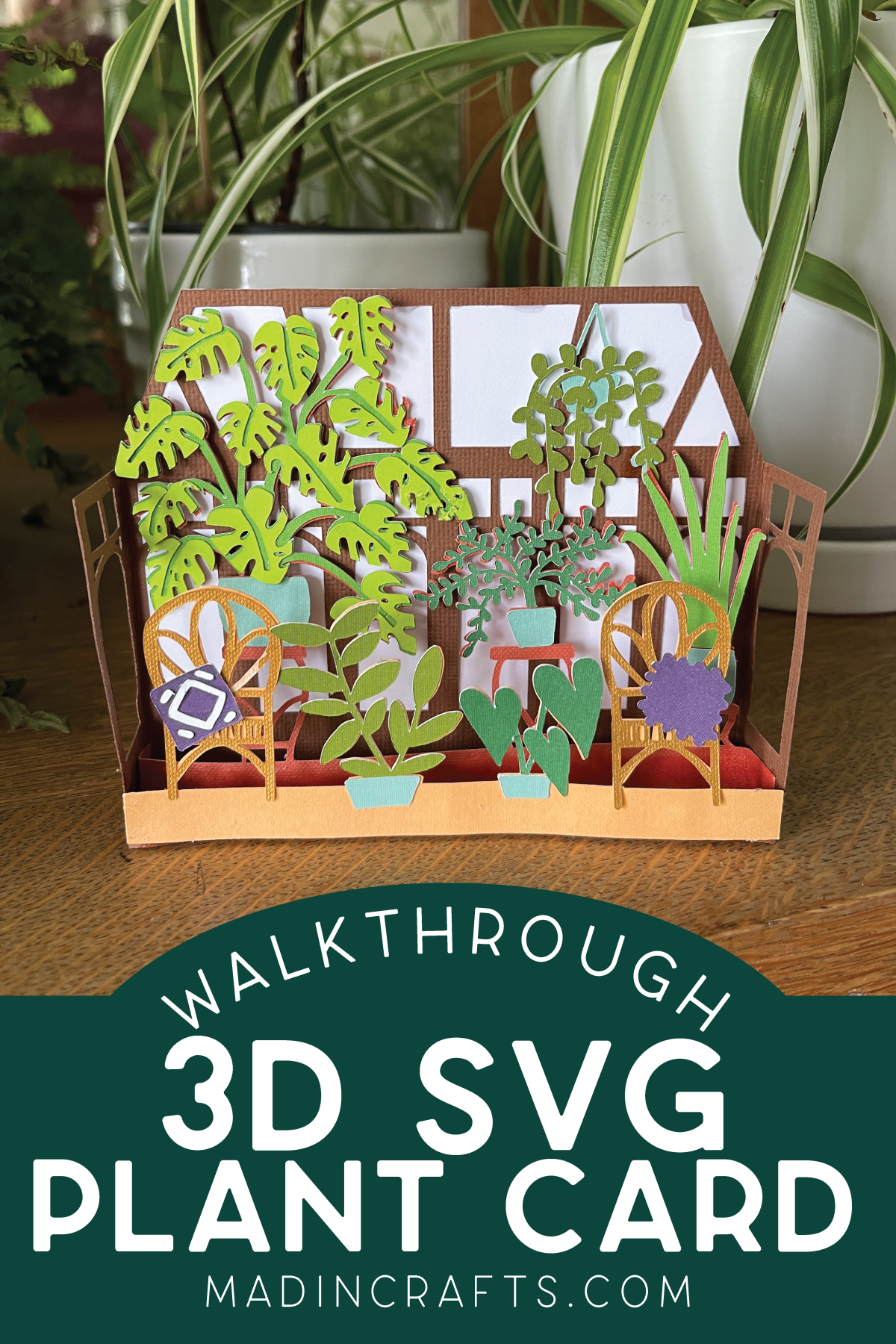 3D Paper Card of houseplants in a sunroom sitting near real plants