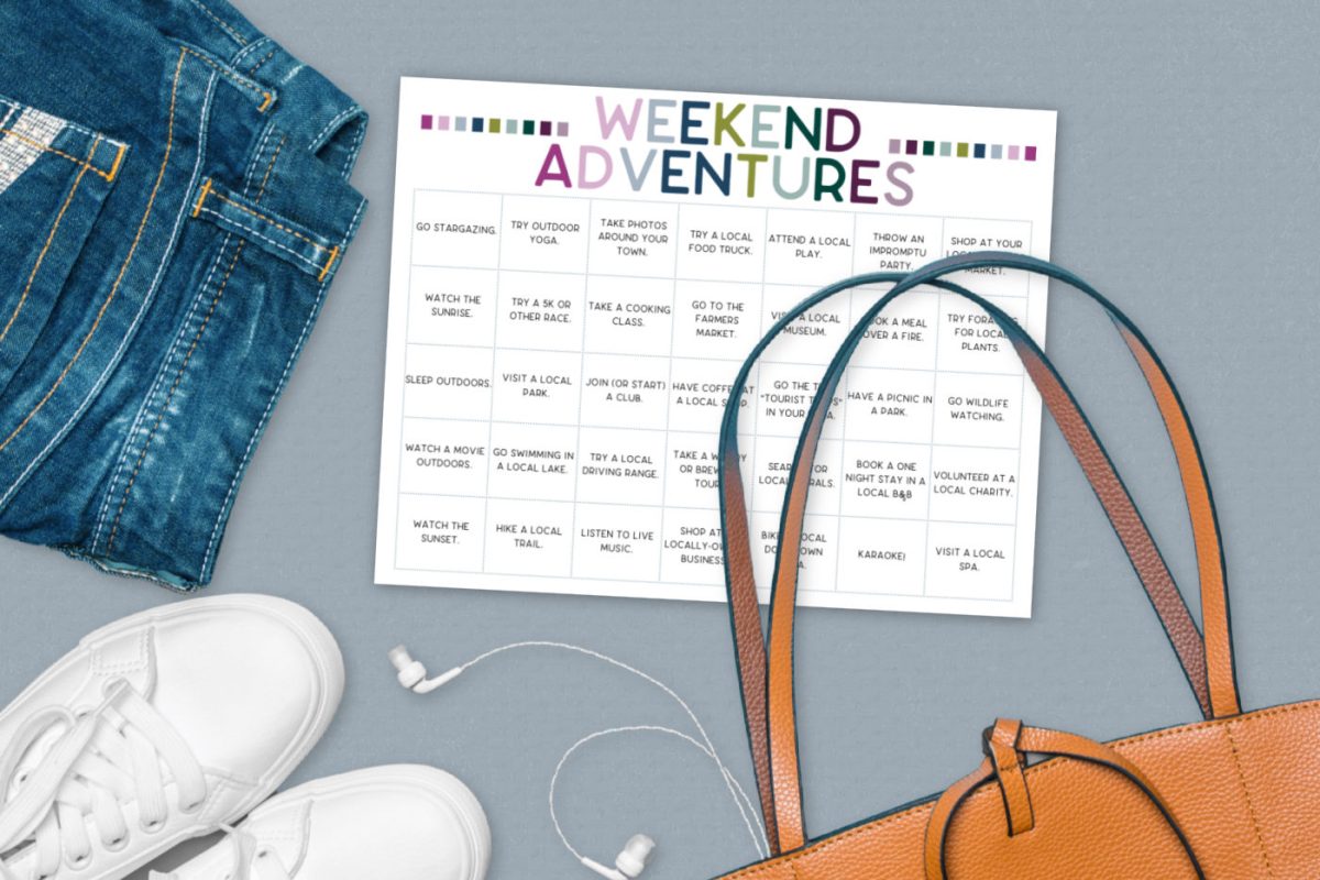A printable local adventure calendar near shoes, a bag, and jeans.