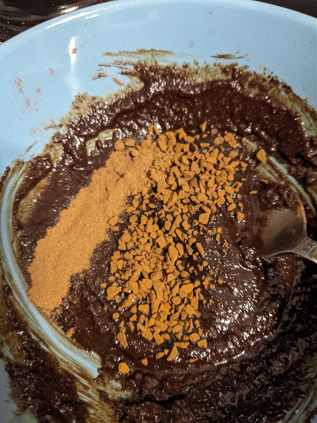 Espresso powder is mixed into a chocolate batter.