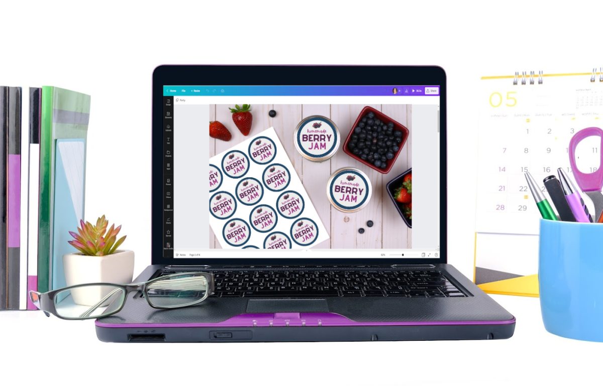 Laptop showing a mockup being edited with Canva