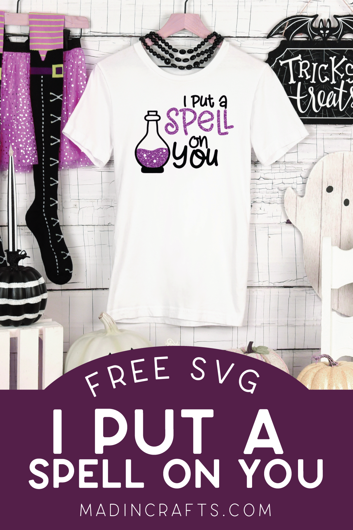 white t-shirt with I Put a Spell On You design near Halloween decor
