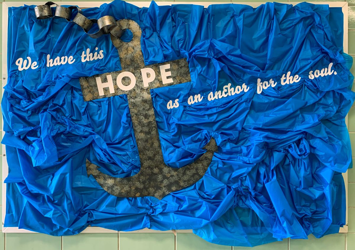 Textured blue bulletin board with anchor design