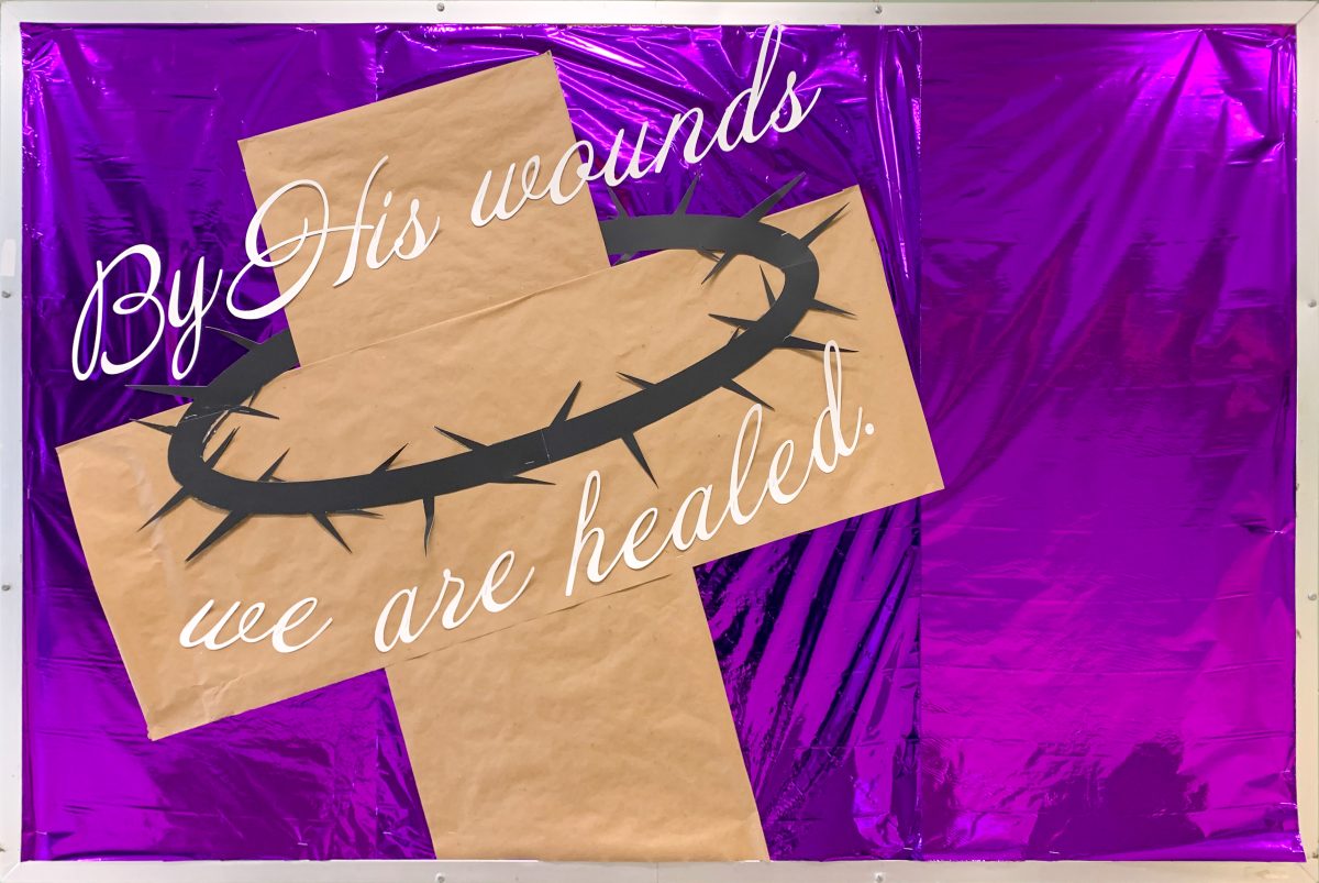 Purple mylar bulletin board with a cross and crown of thorns design