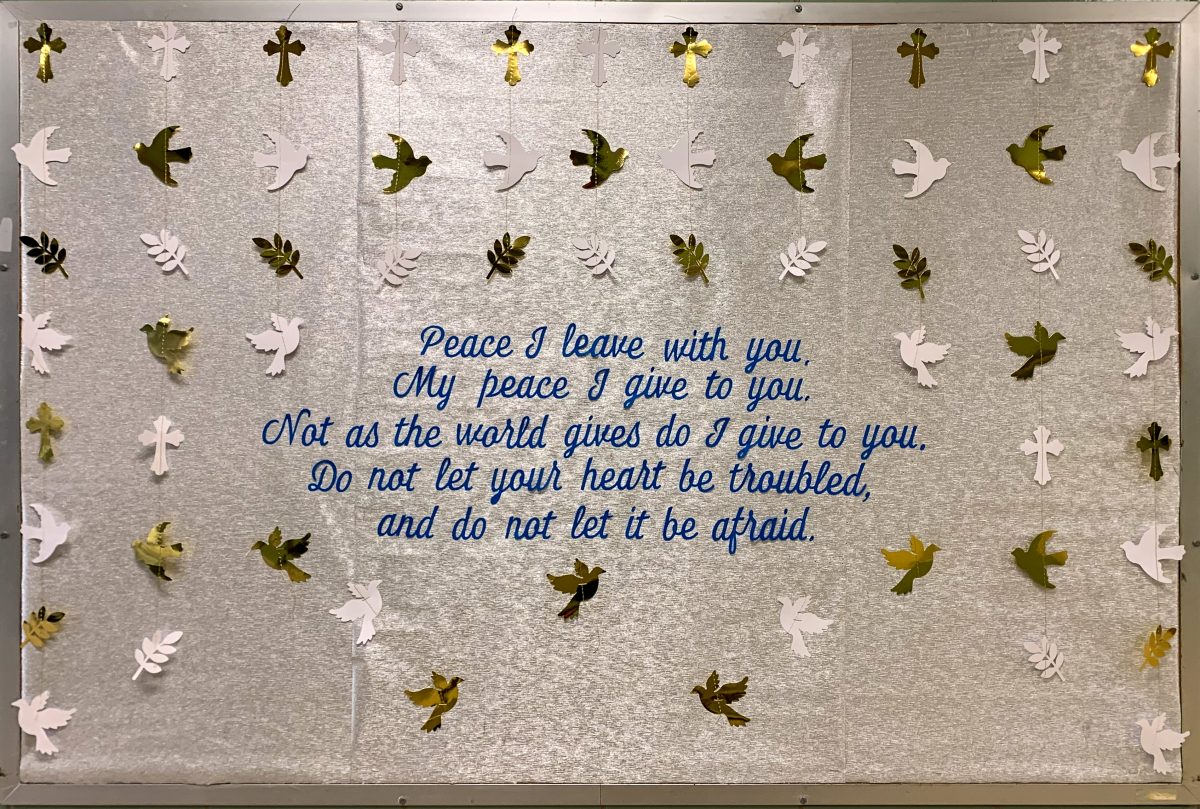Silver bulletin board with doves and olive branches