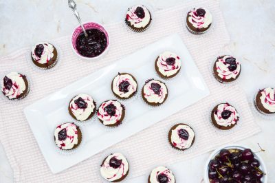 homemade black forest cupcakes on a white tray